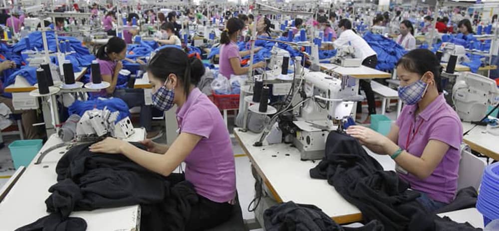 Ultimate guide for custom hoodie manufacturer - Bulk clothing production - 2 Custom clothing manufacturer sewing line
